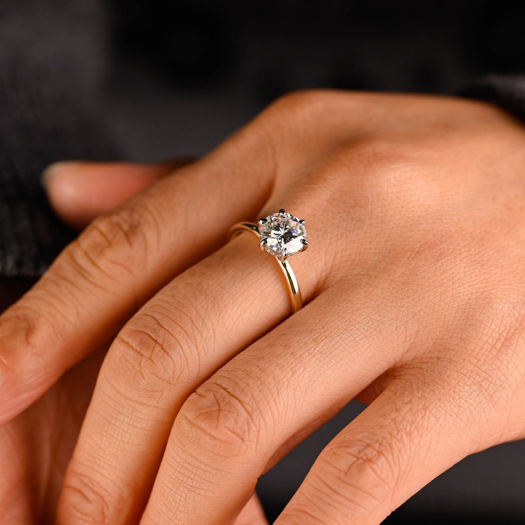 Top-down view of round cut hidden halo engagement ring