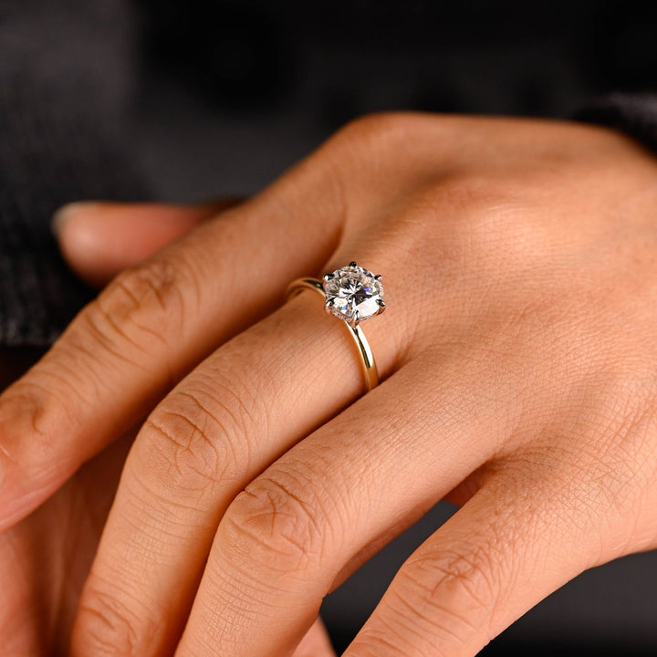 Top-down view of round cut hidden halo engagement ring