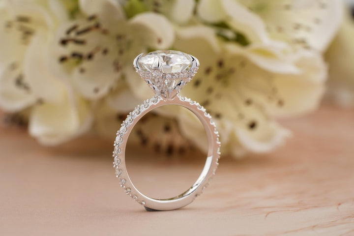 Round cut engagement ring side view showing band detail