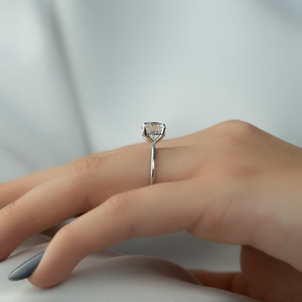 Round cut engagement ring side view showing band detail