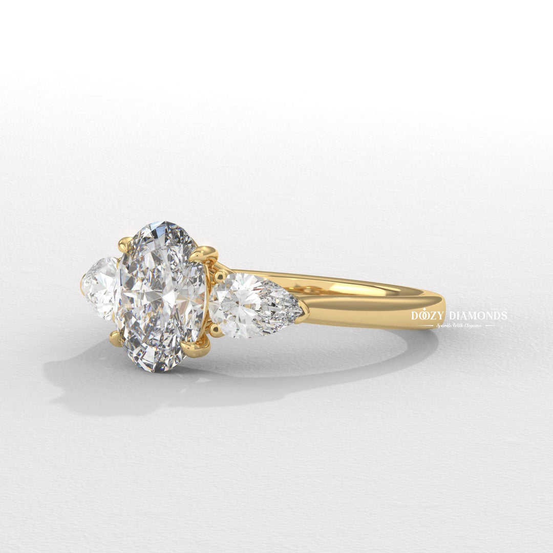 Detailed close-up of oval three stone diamond engagement ring