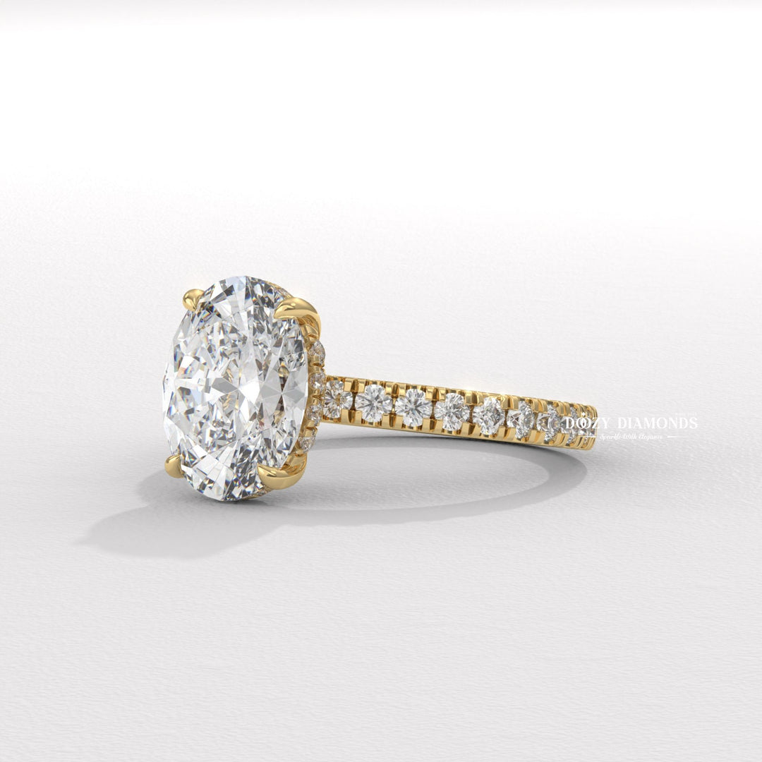 Oval hidden halo lab grown diamond ring side profile in gold setting
