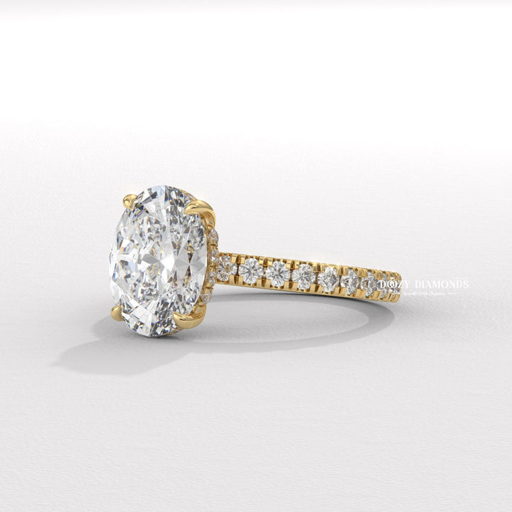 Oval hidden halo lab grown diamond ring side profile in gold setting