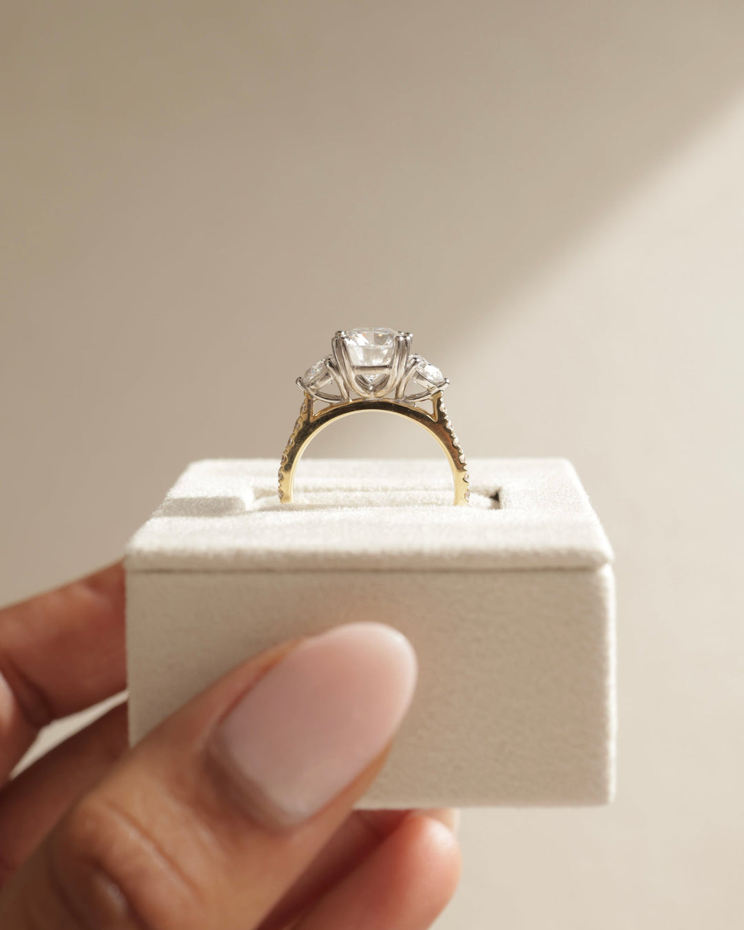 basket three stone setting, cathedral three stone setting, elevated three stone setting, low profile three stone setting, high profile three stone setting, secure three stone setting,