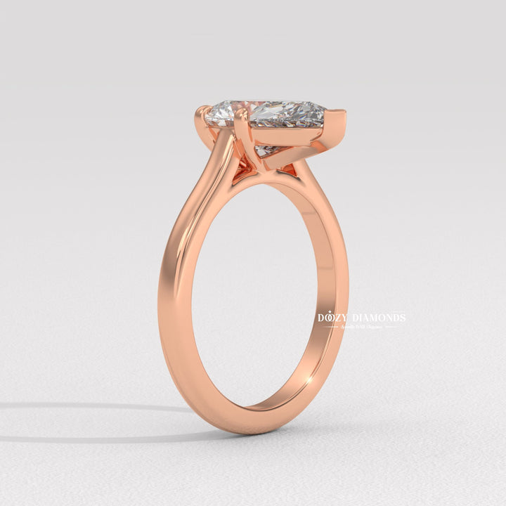 Angled view of pear cut diamond in solitaire setting
