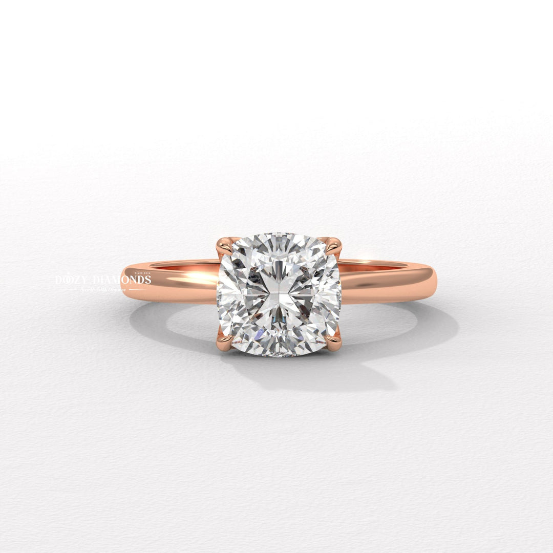 Cushion solitaire engagement ring close-up highlighting diamond sparkle