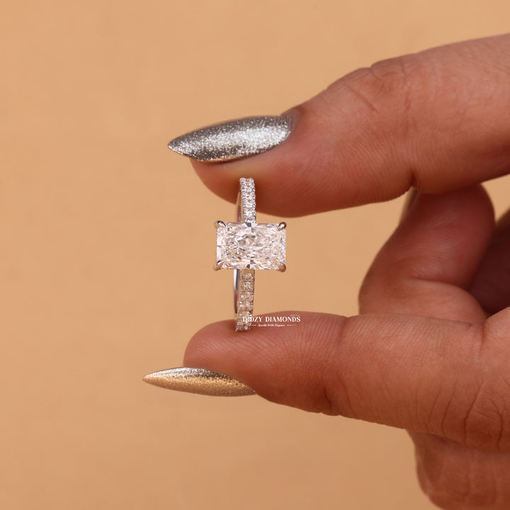 Detailed close-up of radiant hidden halo diamond engagement ring