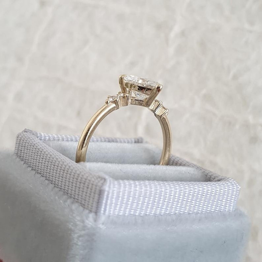 IGI certified heart cut diamond in five stone engagement ring setting