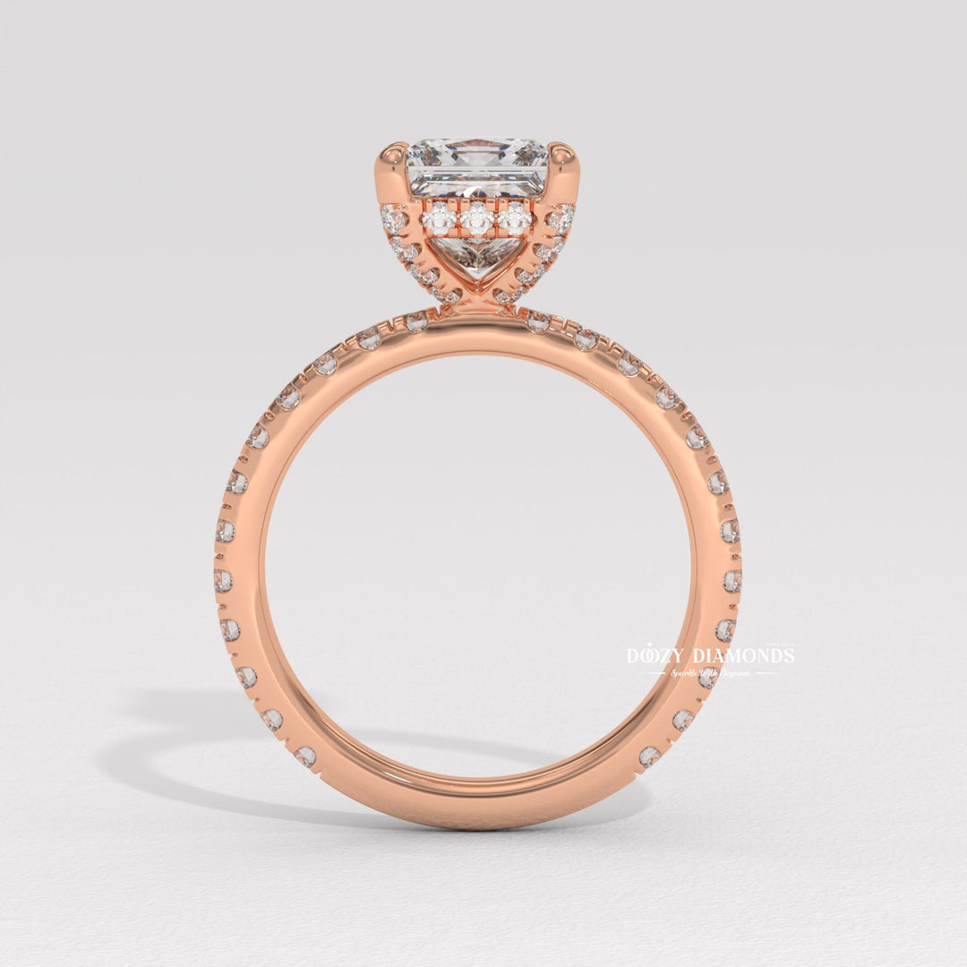 Close-up of princess cut center diamond in hidden halo engagement ring