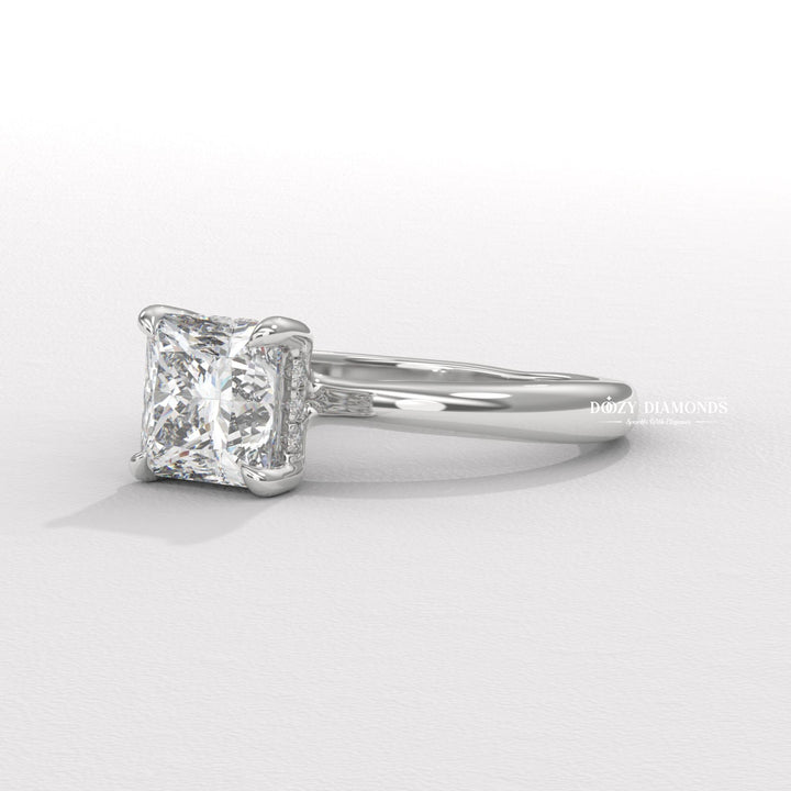 Princess solitaire engagement ring offered in gold and platinum
