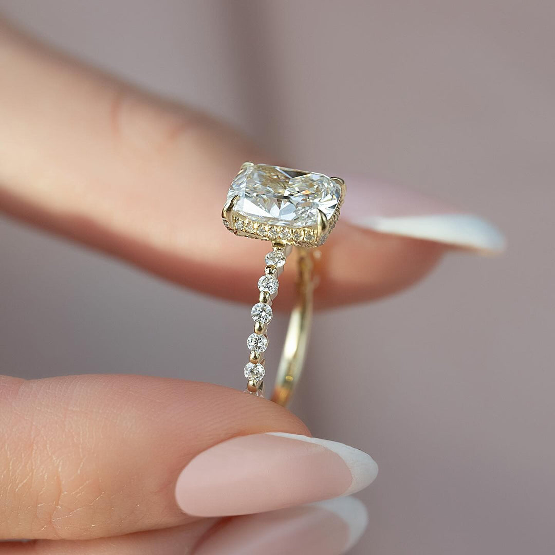 Cushion pave ring set with an IGI graded diamond