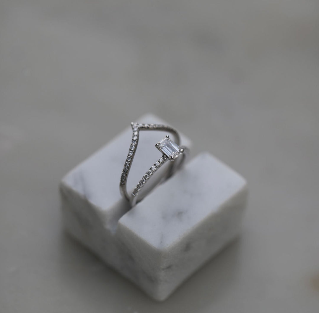 Emerald solitaire engagement ring with certified lab grown diamond