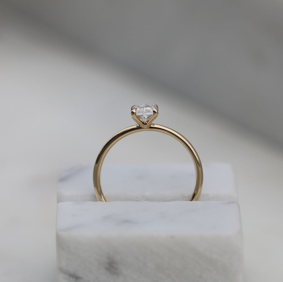 Side angle of radiant solitaire diamond engagement ring