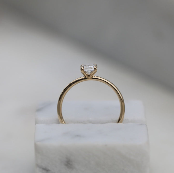 Side angle of radiant solitaire diamond engagement ring