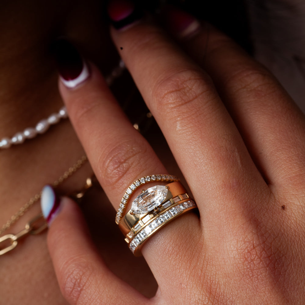 Oval solitaire engagement ring close-up highlighting diamond sparkle
