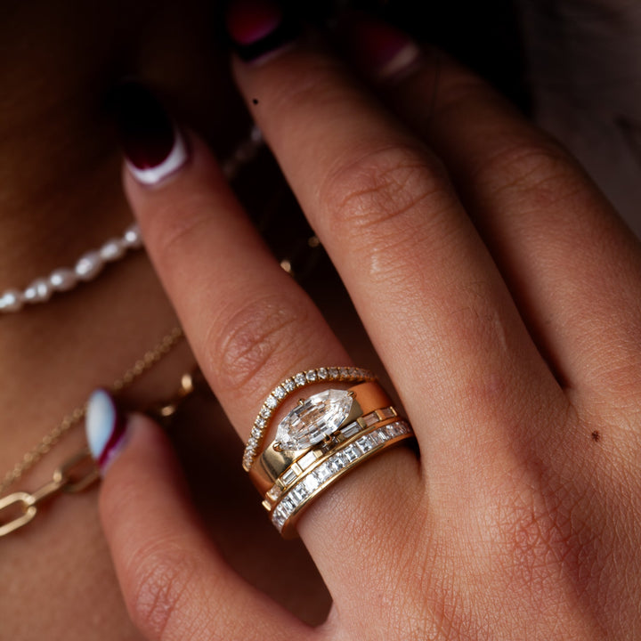 Oval solitaire engagement ring close-up highlighting diamond sparkle