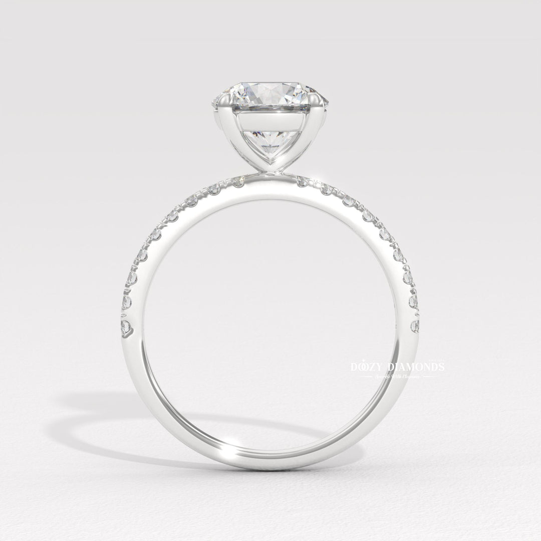 Macro shot of round cut diamond facets in pave ring setting