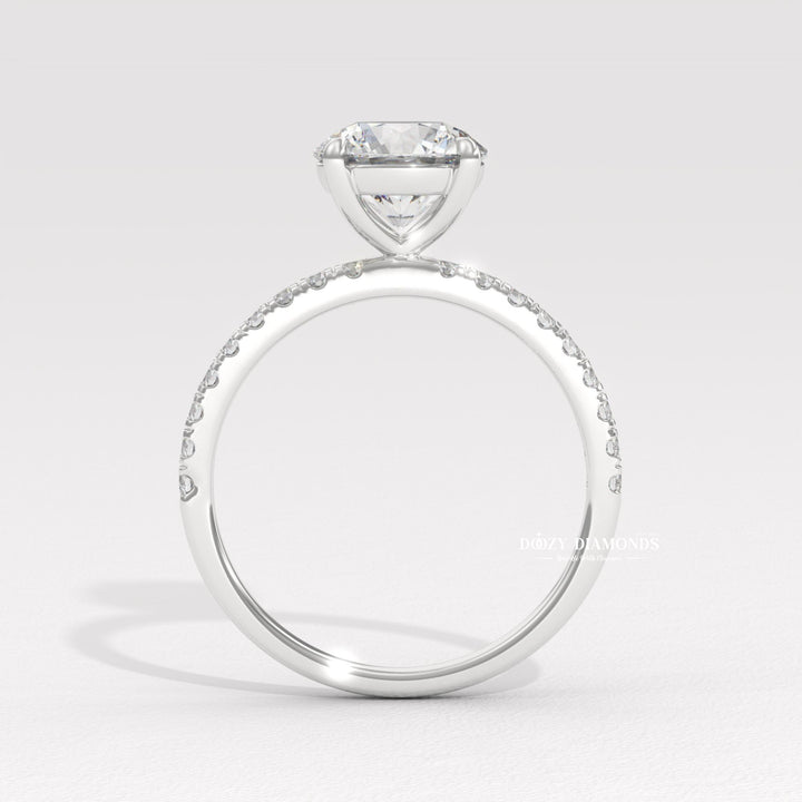 Macro shot of round cut diamond facets in pave ring setting
