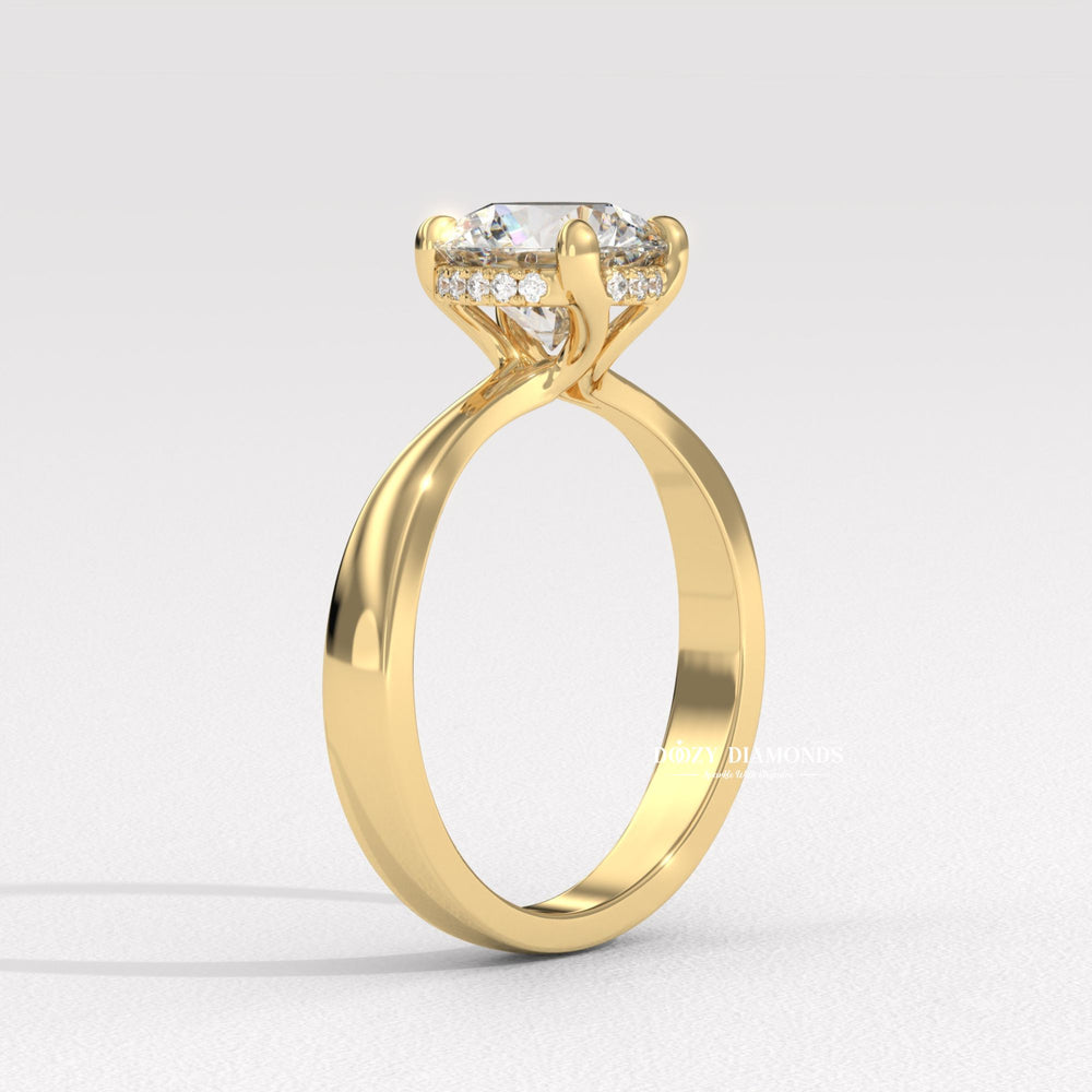 Diamond solitaire engagement ring photographed in natural light