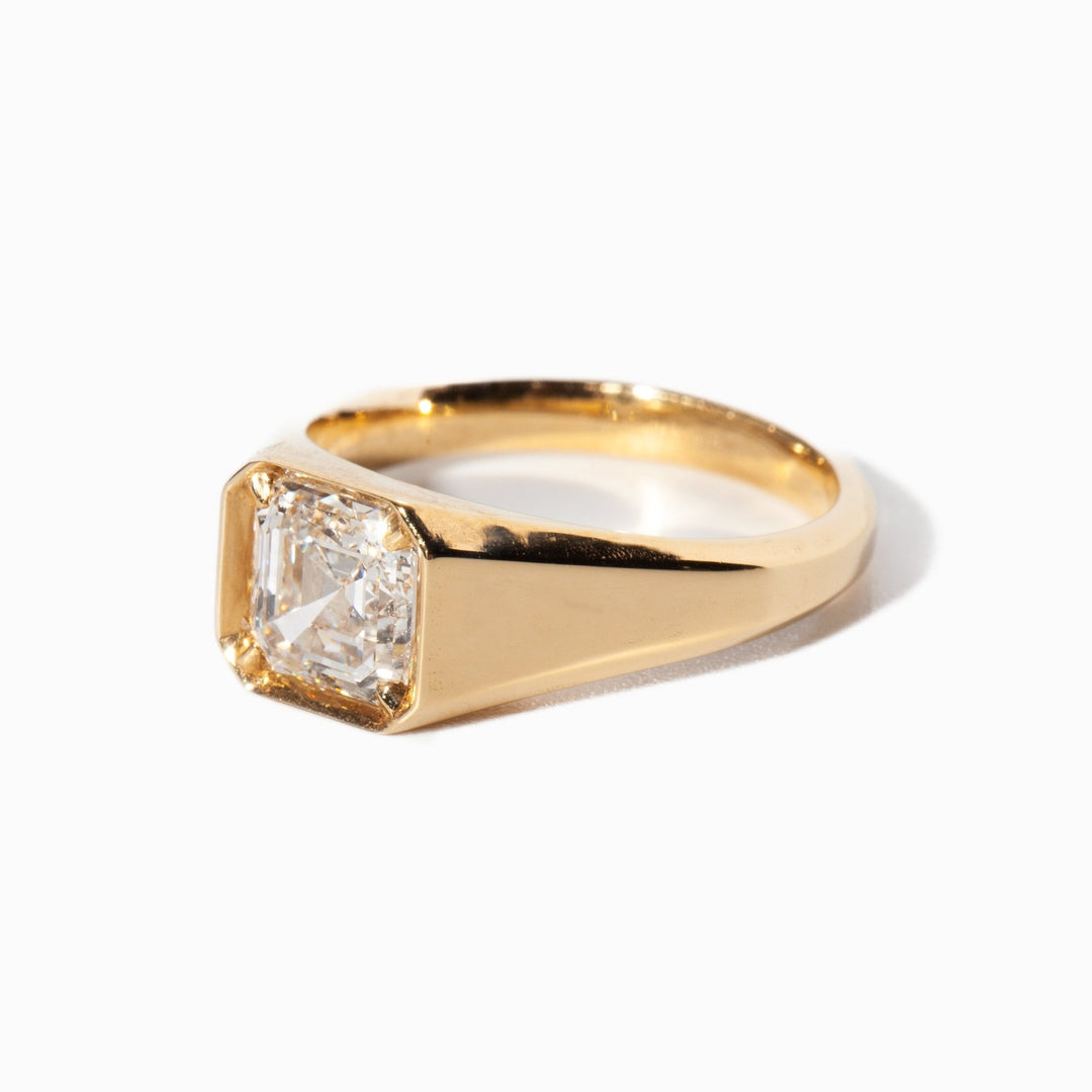 Unboxing view of asscher cut signet diamond engagement ring