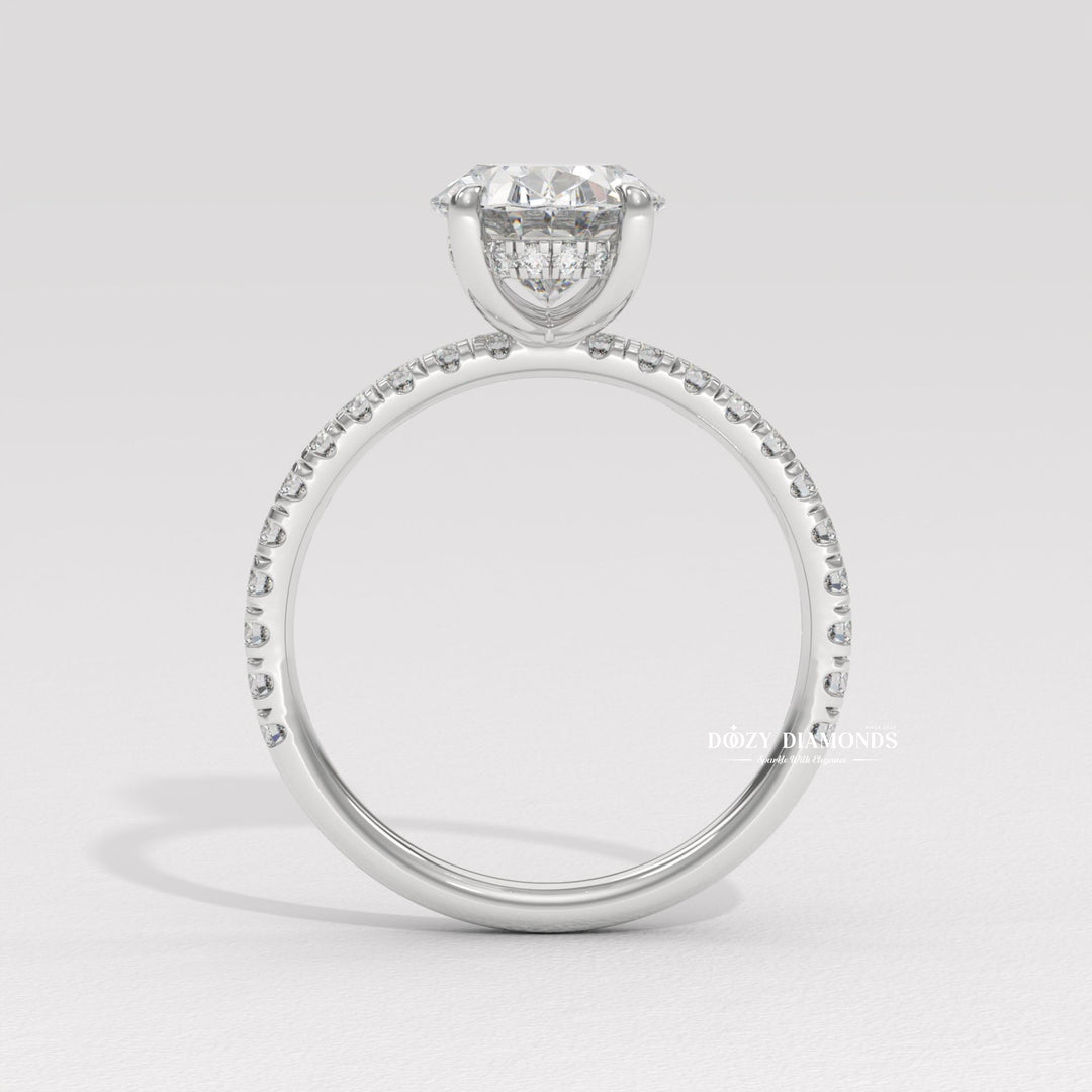 Oval cut engagement ring shown with authenticity certificate