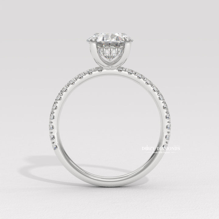 Oval cut engagement ring shown with authenticity certificate