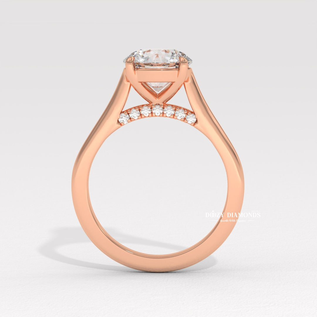 Round solitaire engagement ring viewed from the side