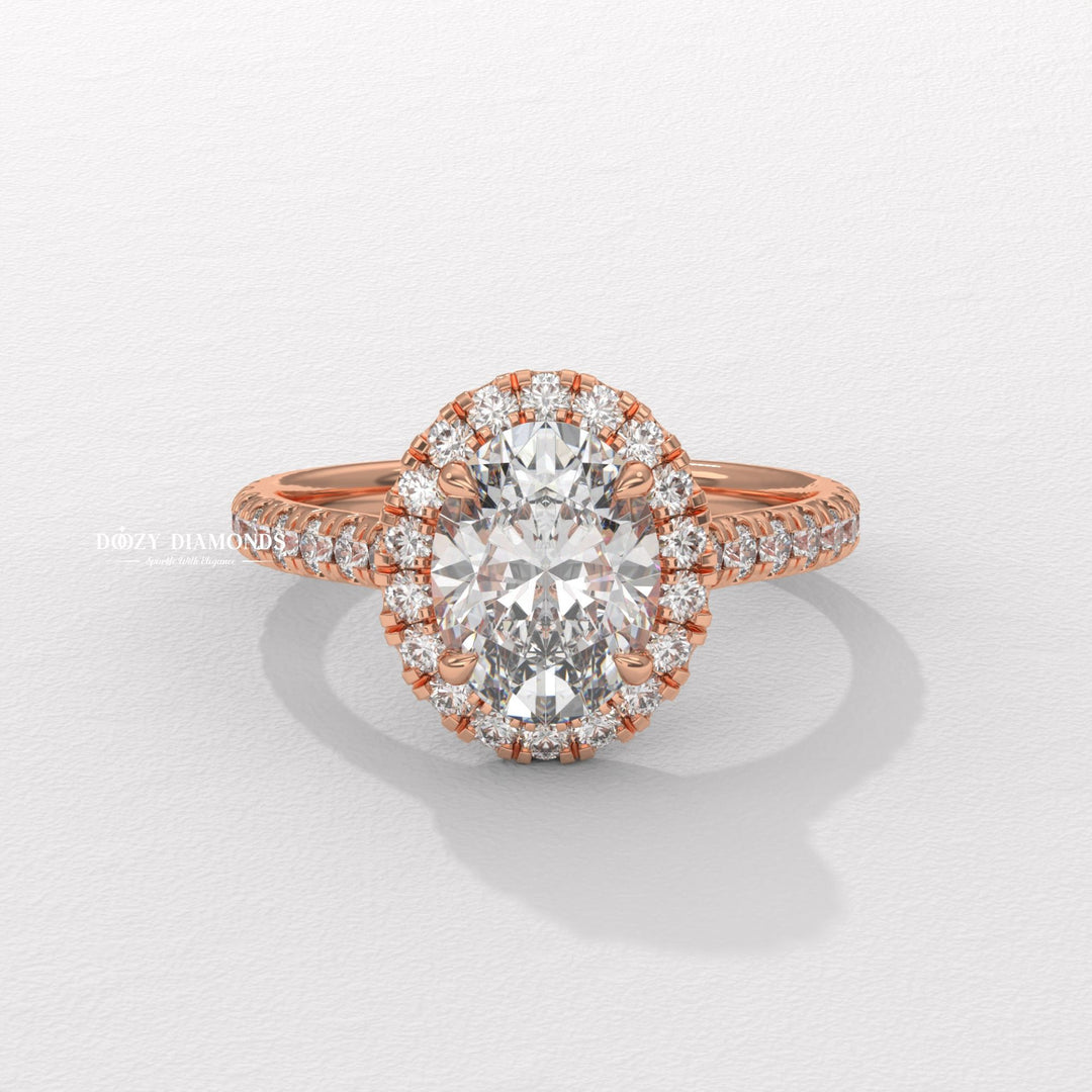 Oval cut diamond ring worn on hand