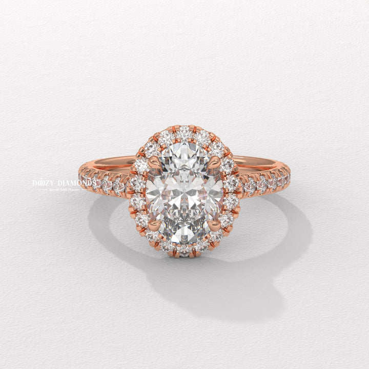 Oval cut diamond ring worn on hand