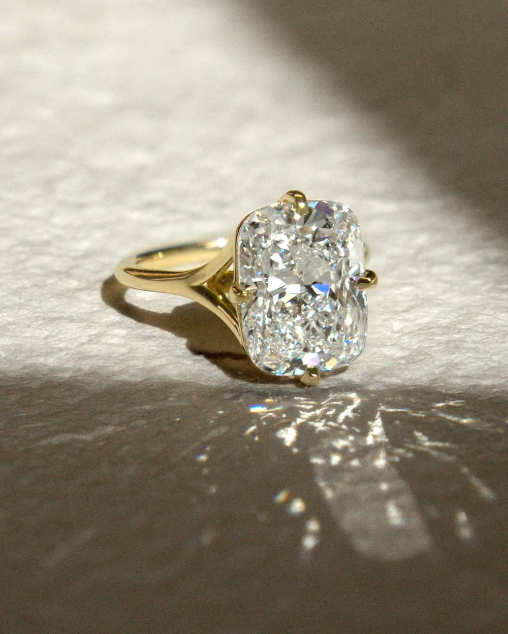 Cushion split shank engagement ring with brilliant diamond sparkle