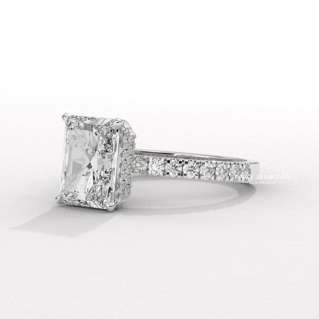 Radiant halo ring set with an IGI graded diamond
