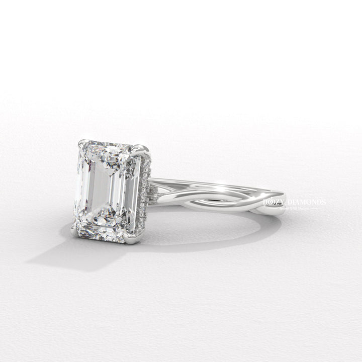 Top-down view of emerald cut solitaire engagement ring