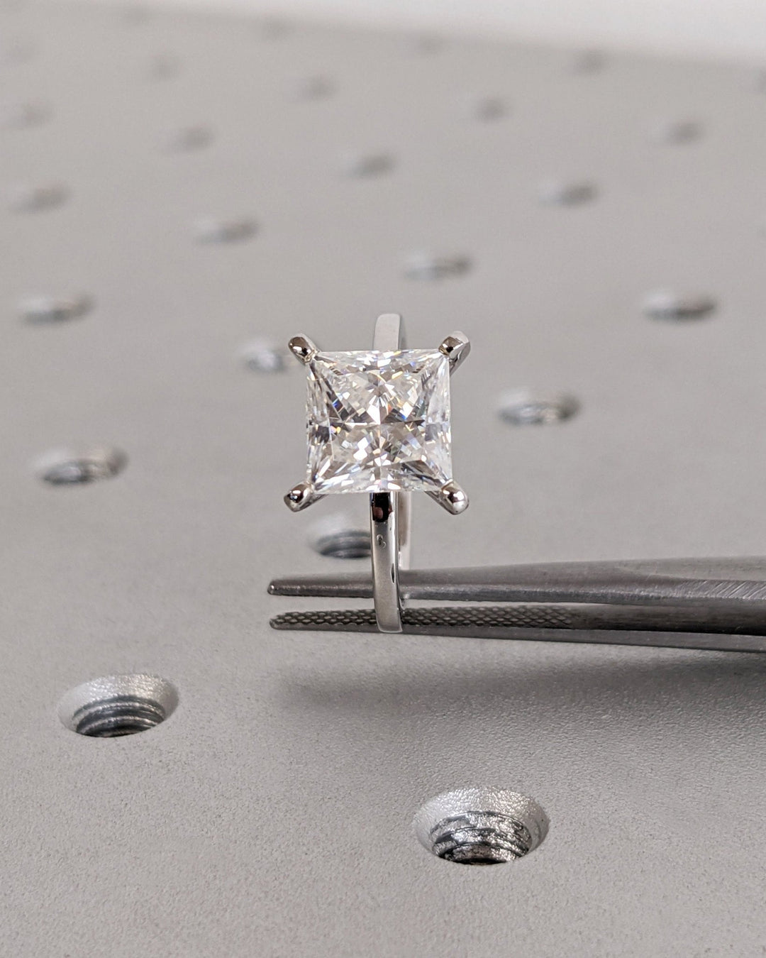 Princess solitaire engagement ring with IGI certificate and packaging