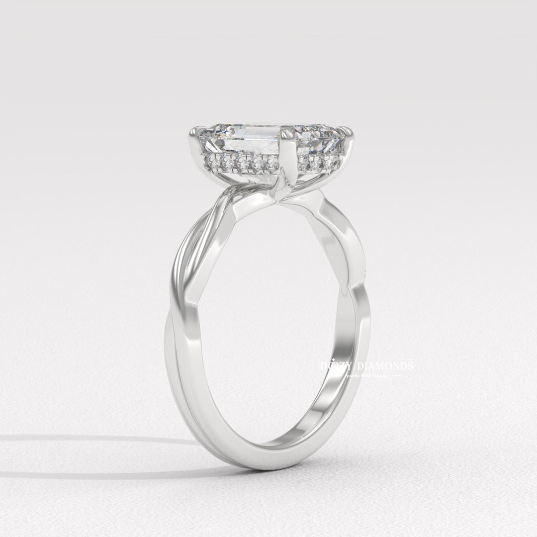 Emerald solitaire engagement ring finished in polished solid gold