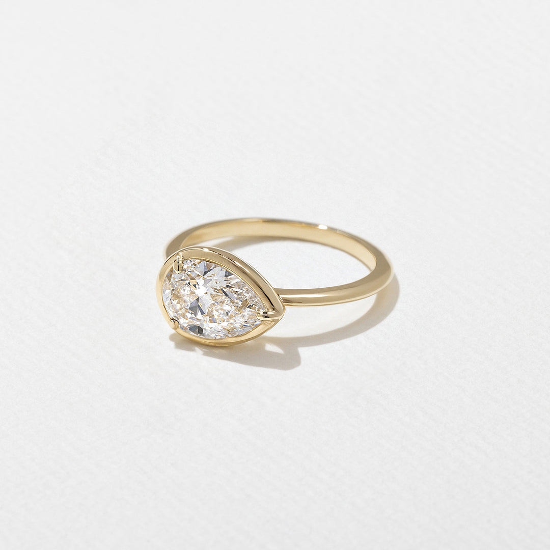 1.0CT Bezel Set Pear E - VS Lab Grown Diamond Ring With Unique Curved Band - Doozy Diamonds