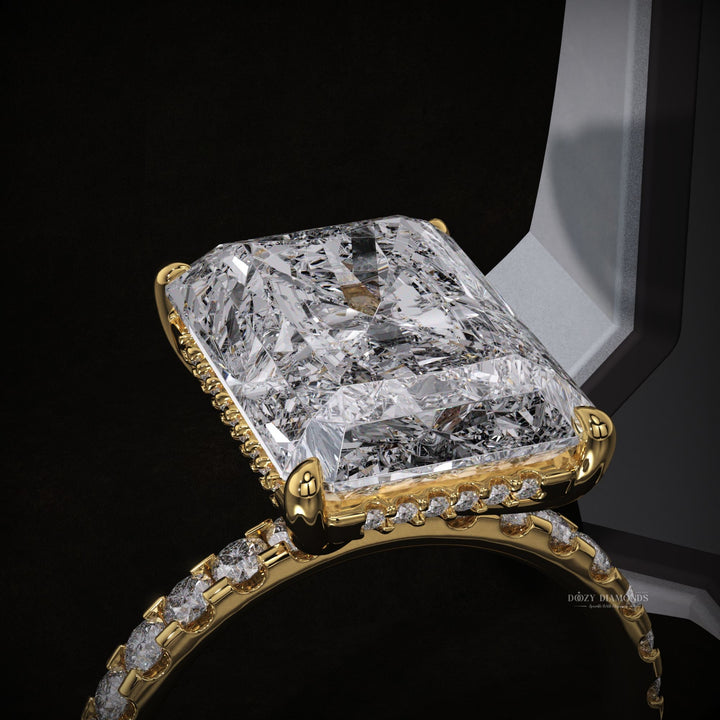 Radiant hidden halo diamond ring presented in signature gift packaging