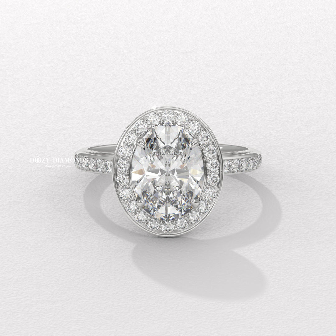 IGI certified oval cut diamond in halo engagement ring setting