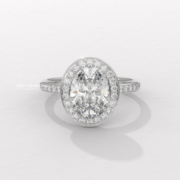 IGI certified oval cut diamond in halo engagement ring setting