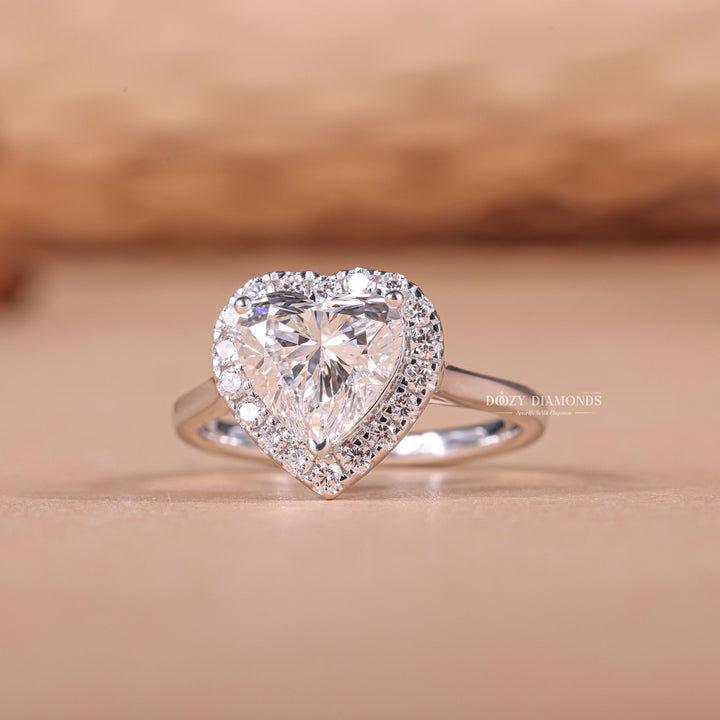 Heart halo lab grown diamond ring fitted on finger