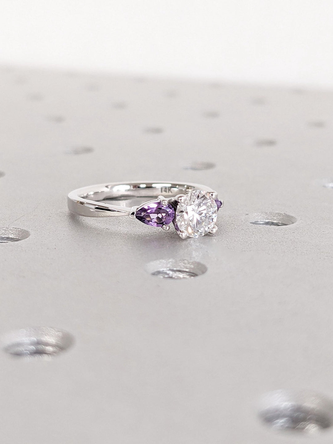 Unboxing view of round cut solitaire diamond engagement ring