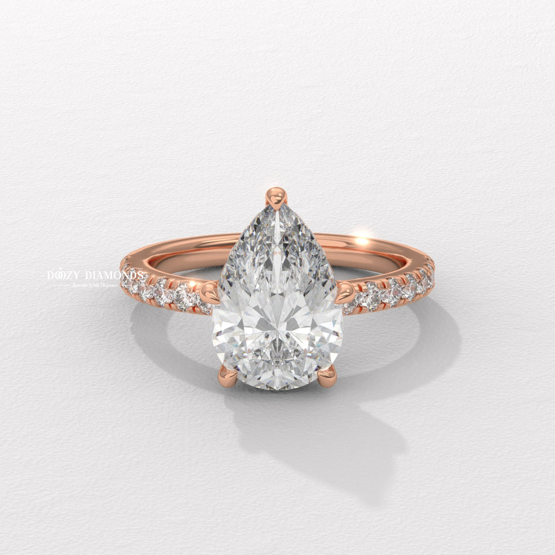 Pear solitaire engagement ring with brilliant diamond sparkle