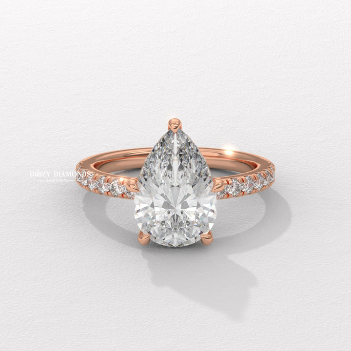 Pear solitaire engagement ring with brilliant diamond sparkle