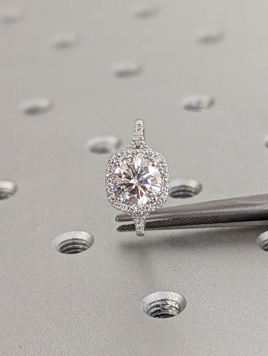 Round pave engagement ring offered in gold and platinum