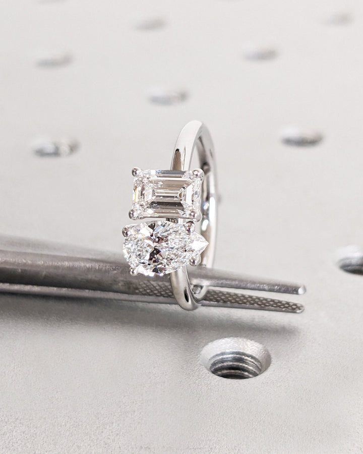 Pear cut engagement ring side view showing band detail