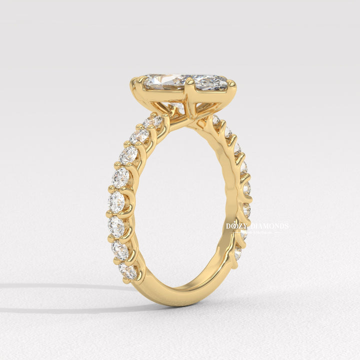 Marquise solitaire lab grown diamond ring side profile in gold setting