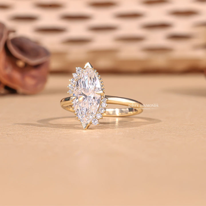 Marquise cut cluster engagement ring with IGI certified center diamond
