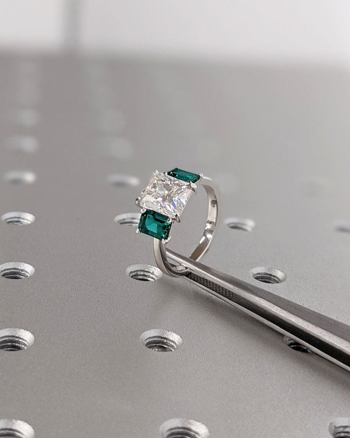 Radiant cut engagement ring shown with authenticity certificate