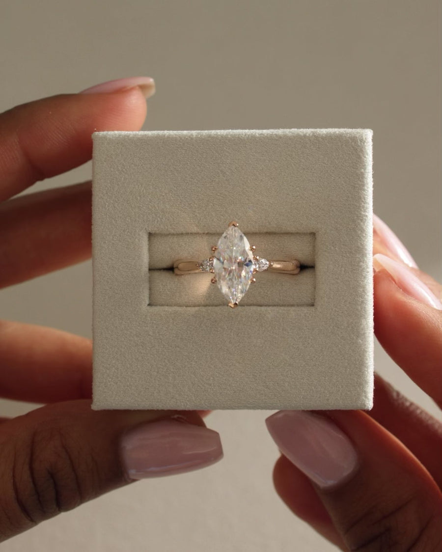 marquise engagement setting, side stone setting, side stone engagement setting, cathedral three stone setting, classic three stone setting, modern three stone setting, minimalist three stone setting