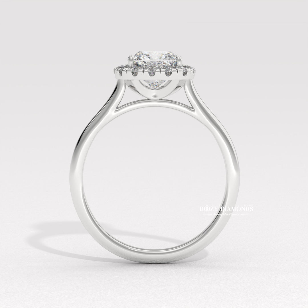Lifestyle shot of cushion solitaire diamond ring on hand