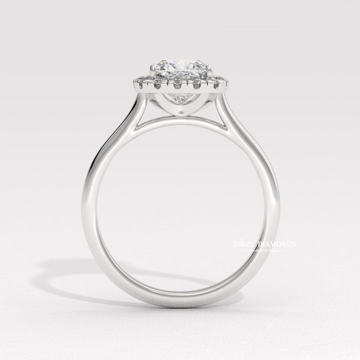 Lifestyle shot of cushion solitaire diamond ring on hand